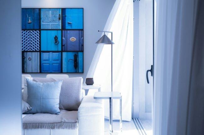 silver and white table floor lamp on recently restored home