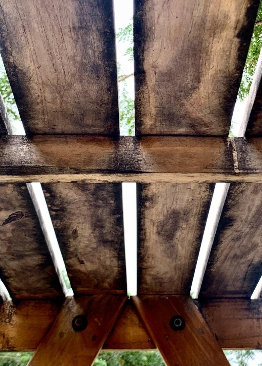 a wooden structure with a hole in it